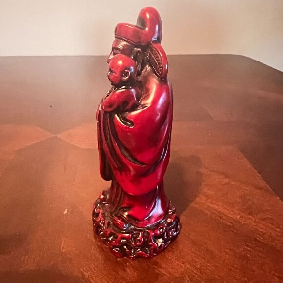 Asian-Inspired Red Resin Figurine Elder Holding Child Detailed Decorative Statue - Picture 3 of 7